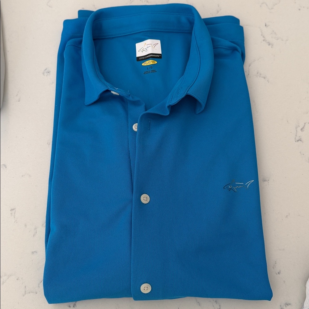 Greg Norman Collection Men’s Short Sleeve Vibrant Blue Button Front Golf Polo